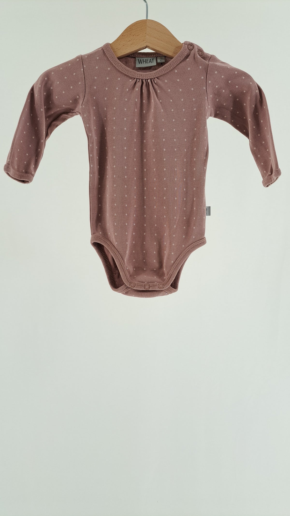 WHEAT • BODY • STØVET ROSA STJERNER • STR. 62
