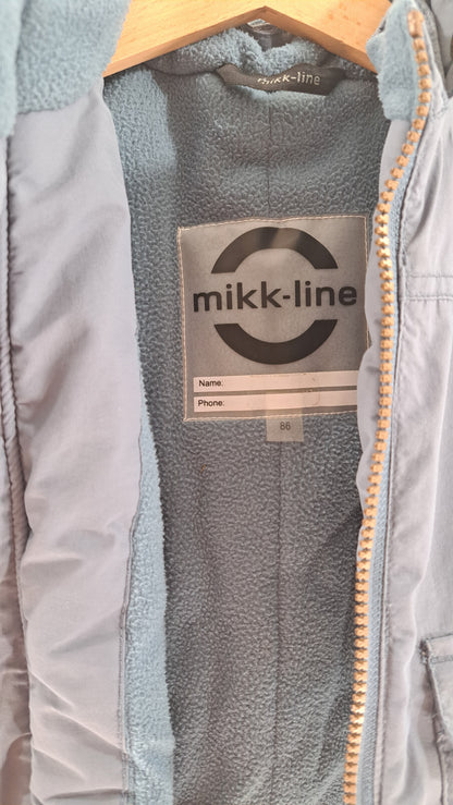 Nærbillede af Mikk-line brandlabel og fleecefor inde i jakken